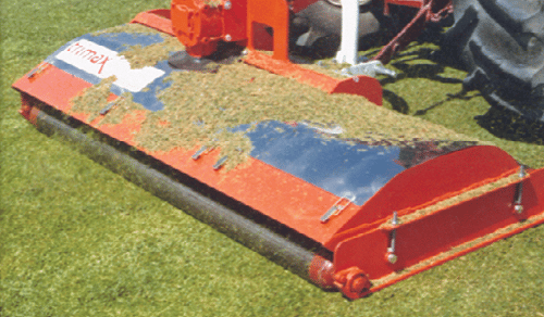 Red Lawn Mower with Tons of Grass | Trimax Mowing Systems